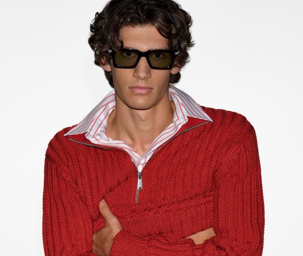 Calvin Klein Eyewear studio portrait in red knitwear