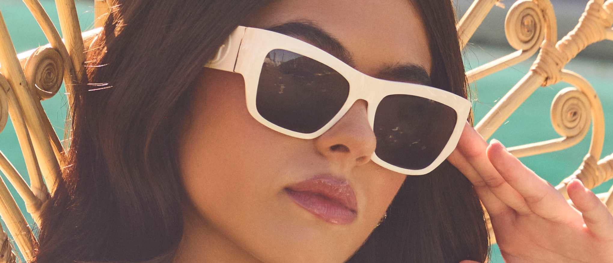 Official GUESS eyewear campaign, model wearing ivory sunglasses